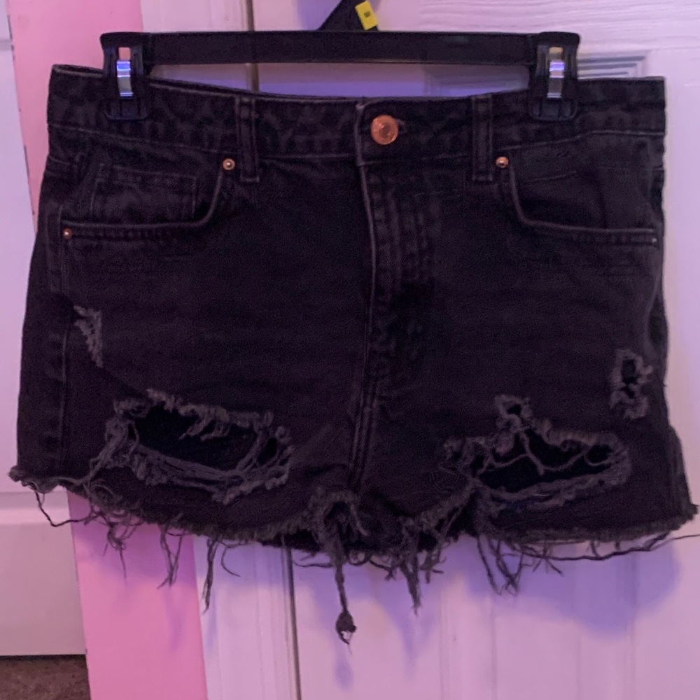 Distressed black jean shorts